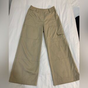 DISSH Wide Leg Khaki Cargo Pants with large pockets.